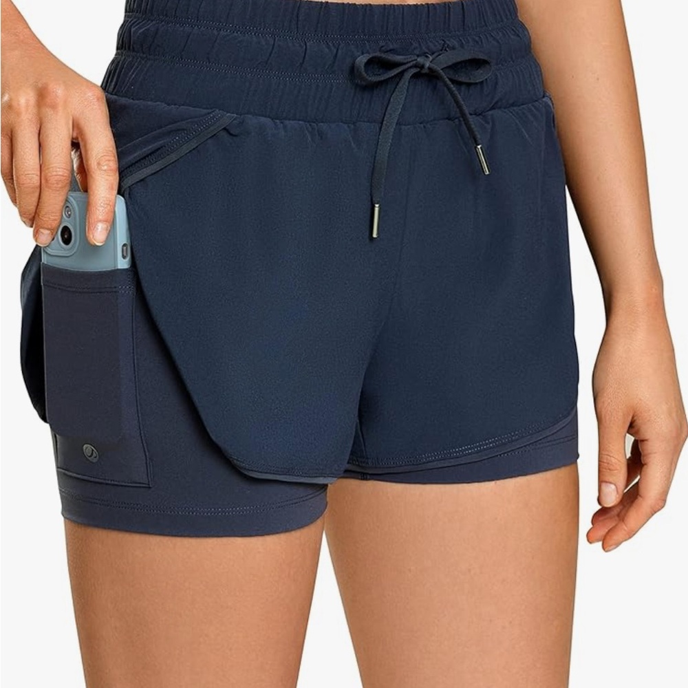 CRZ YOGA Women's Mid Waisted 2 in 1 Athletic Sport Shorts Zip Pocket, Small